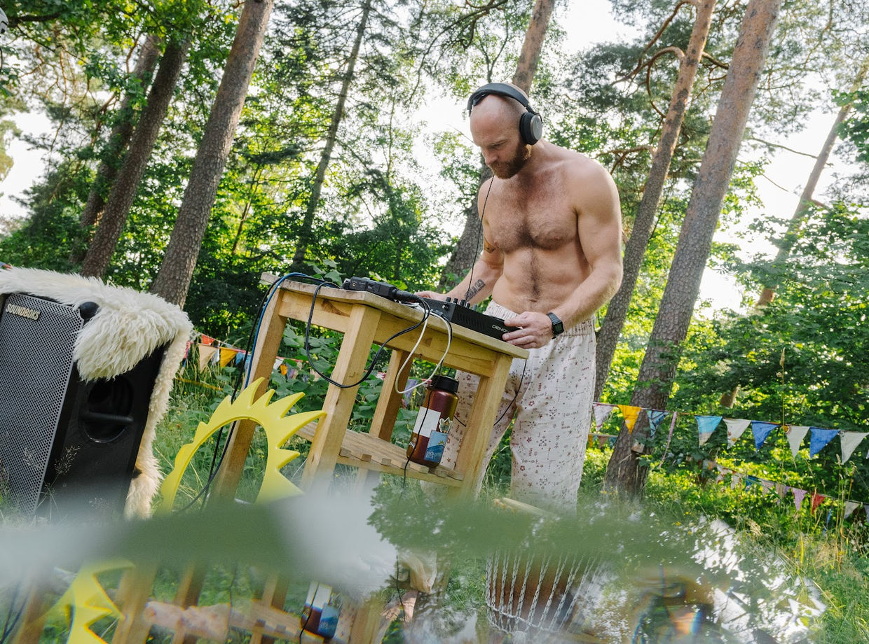 The DJ among sunflowers in the garden