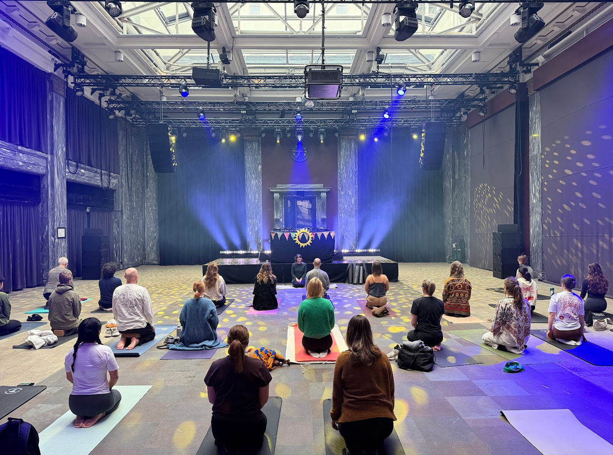 Morning yoga in the great hall at Sentralen