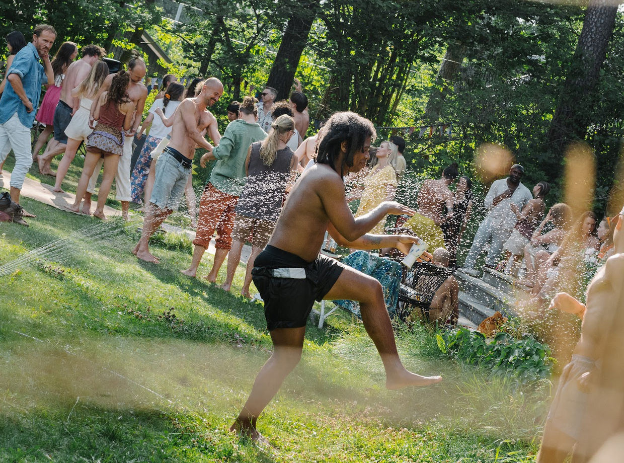 A dancer leaping on the lawn