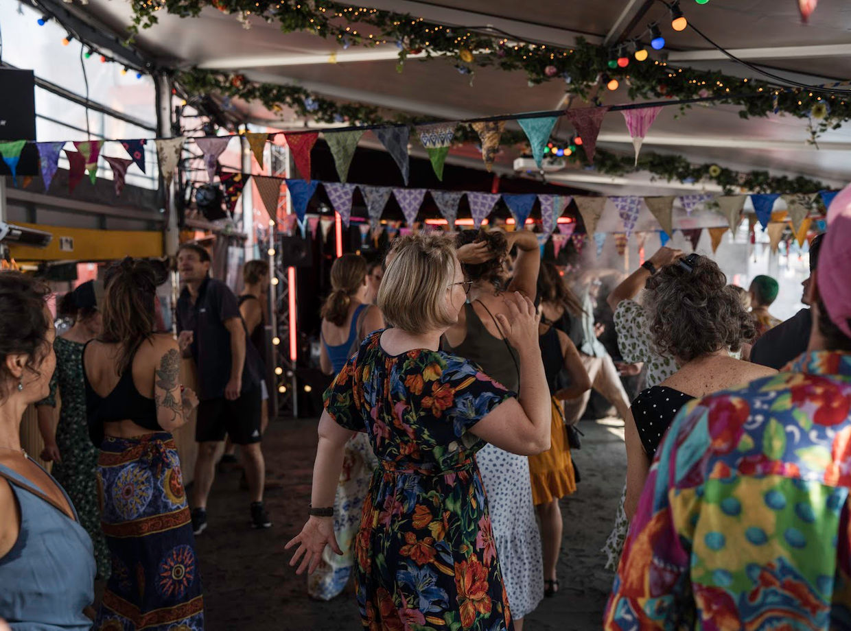 A crowd dancing on the boat deck