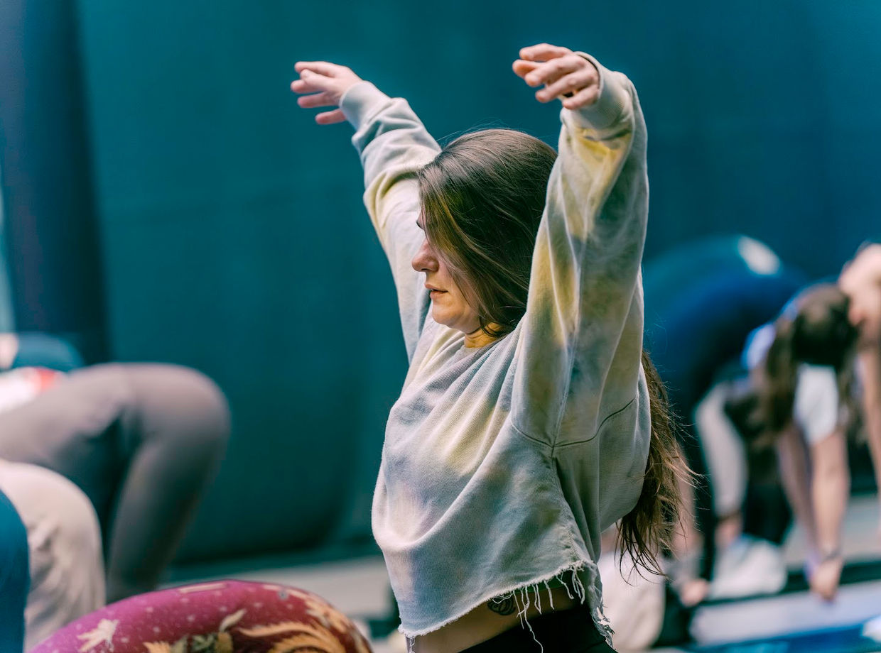 A dancer stretching in the morning yoga