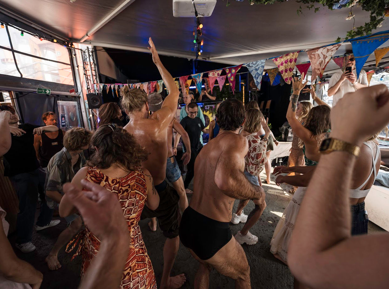 Dancers celebrating on deck