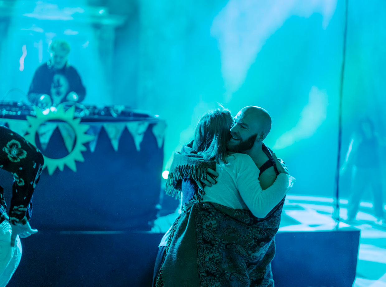 A hug in front of the DJ