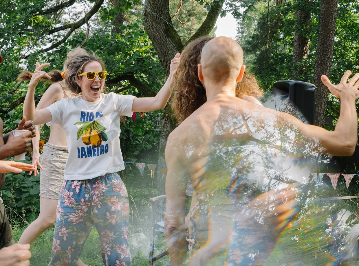 A dancer laughing in the garden