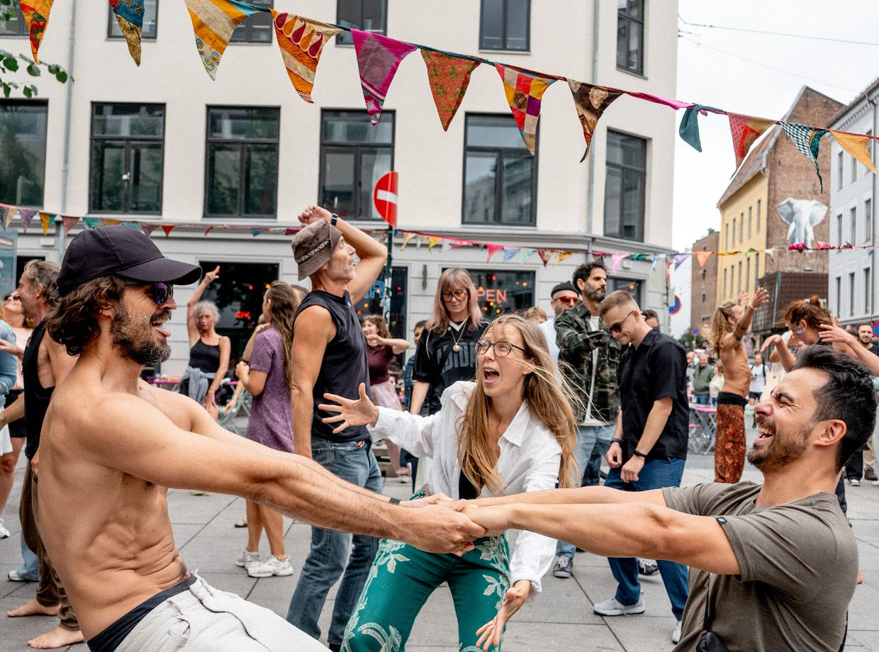 Holding hands and spinning in the street
