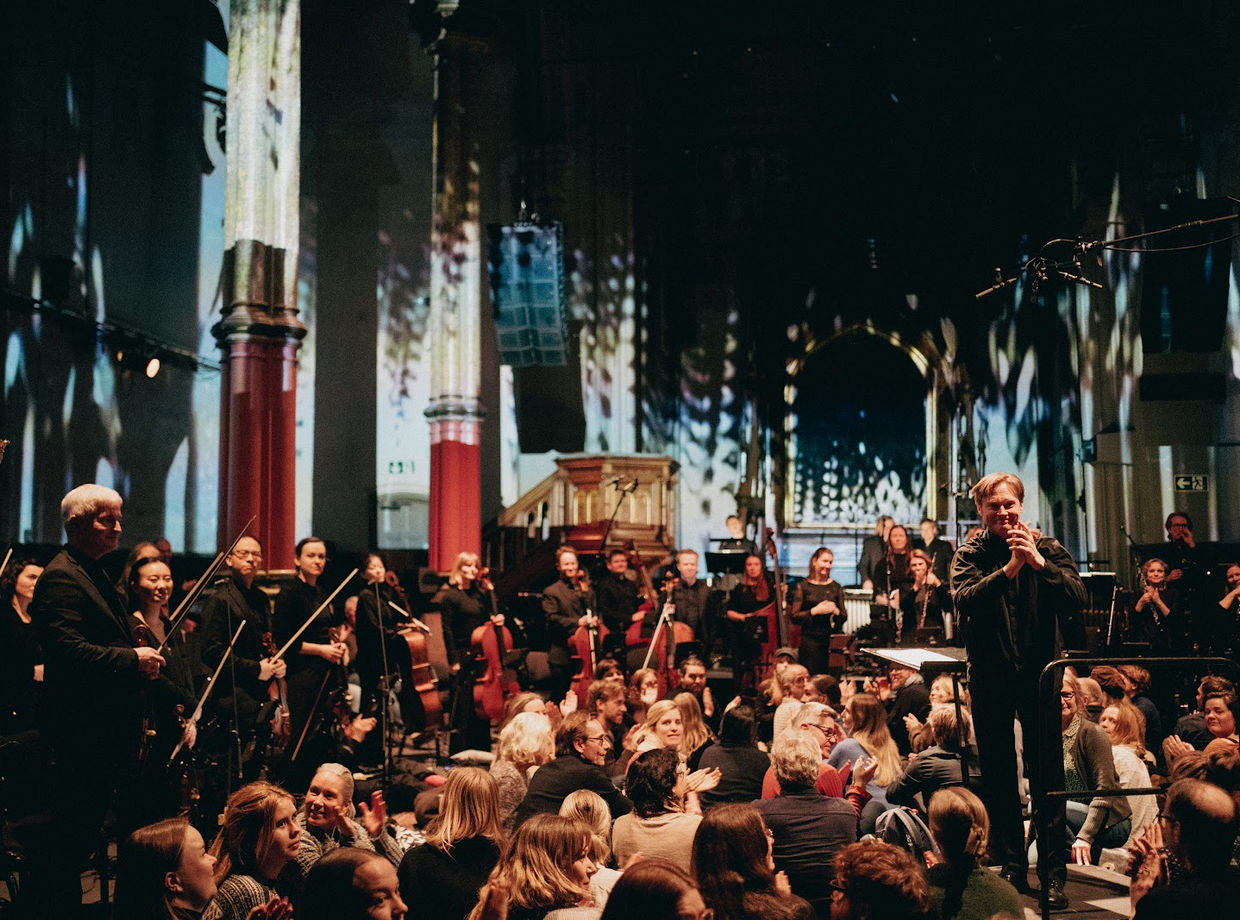 An ensemble playing to a full church