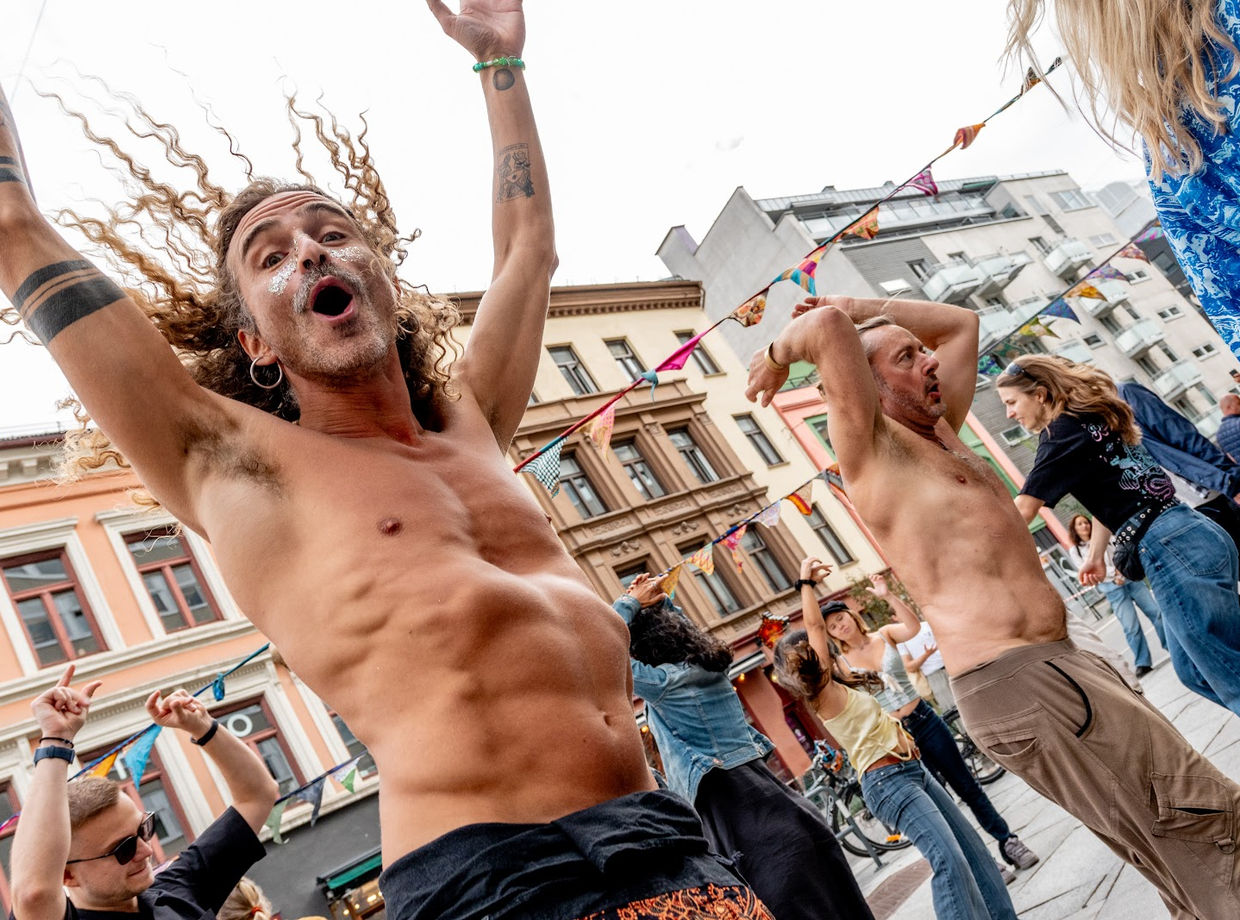 Dancers cheering in the street