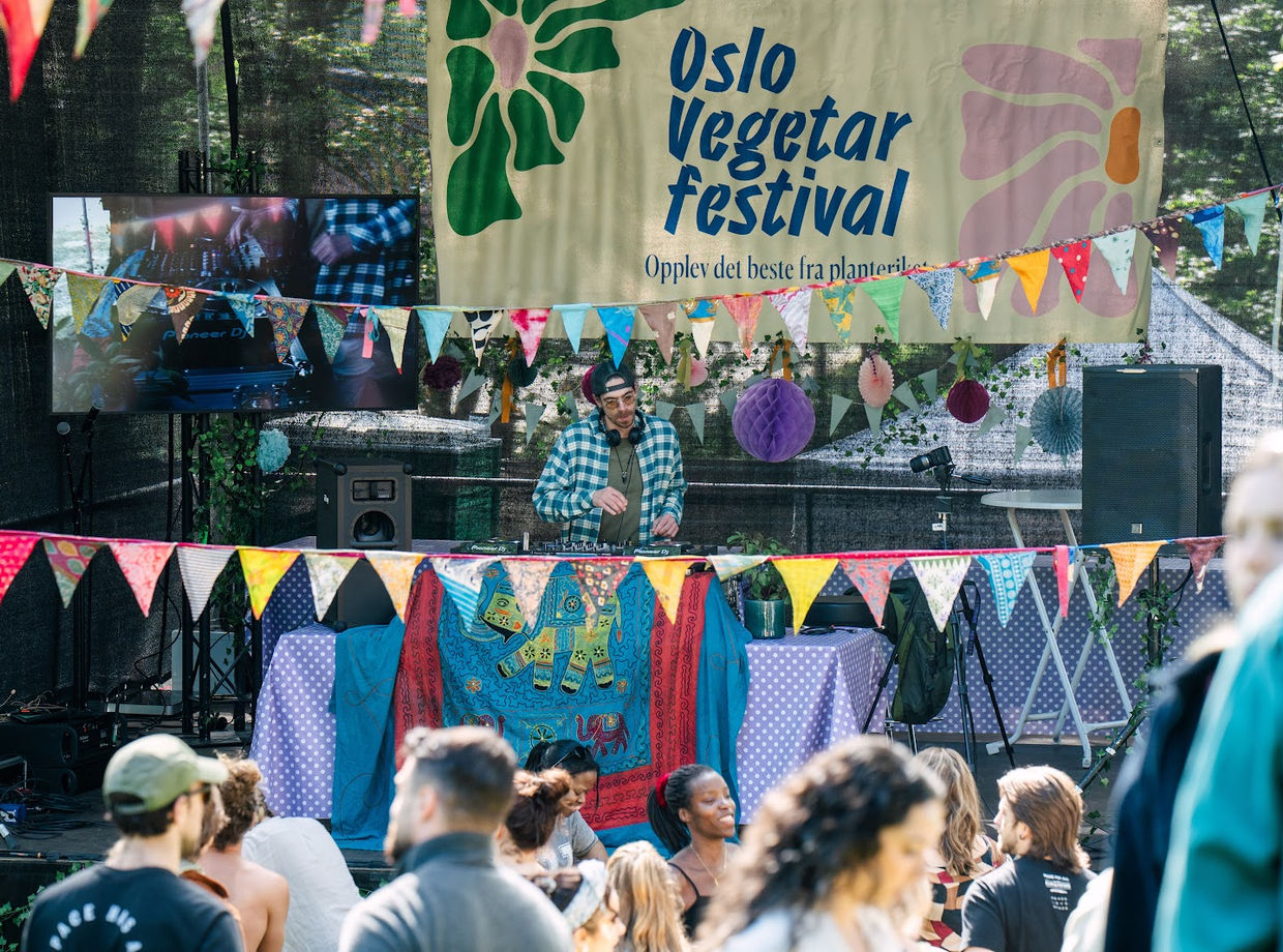 The stage with the festival banner and the crowd