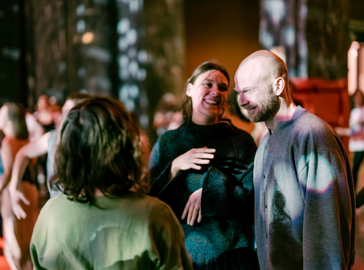 Friends chatting on the dance floor