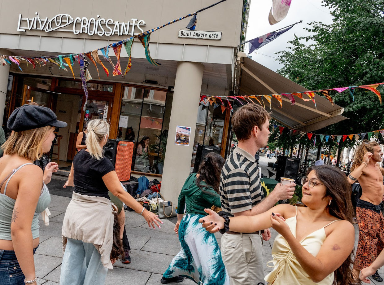 Dancing outside the café in the street