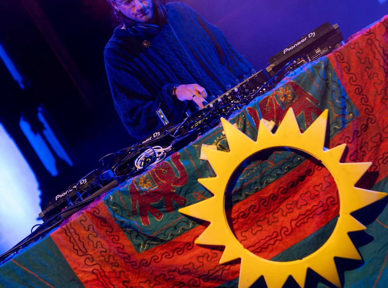 The DJ behind the sun flag