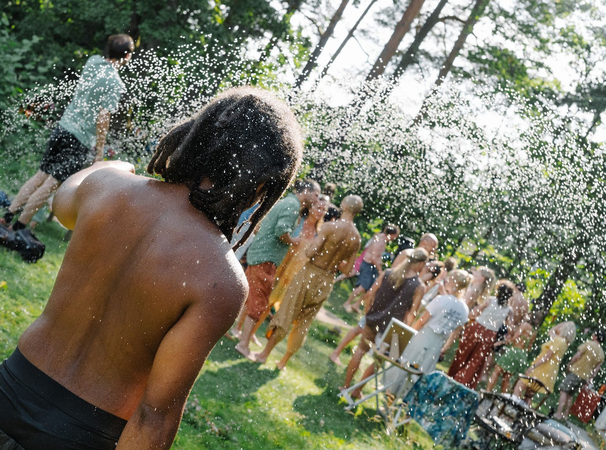 Dancers in the sunlit garden