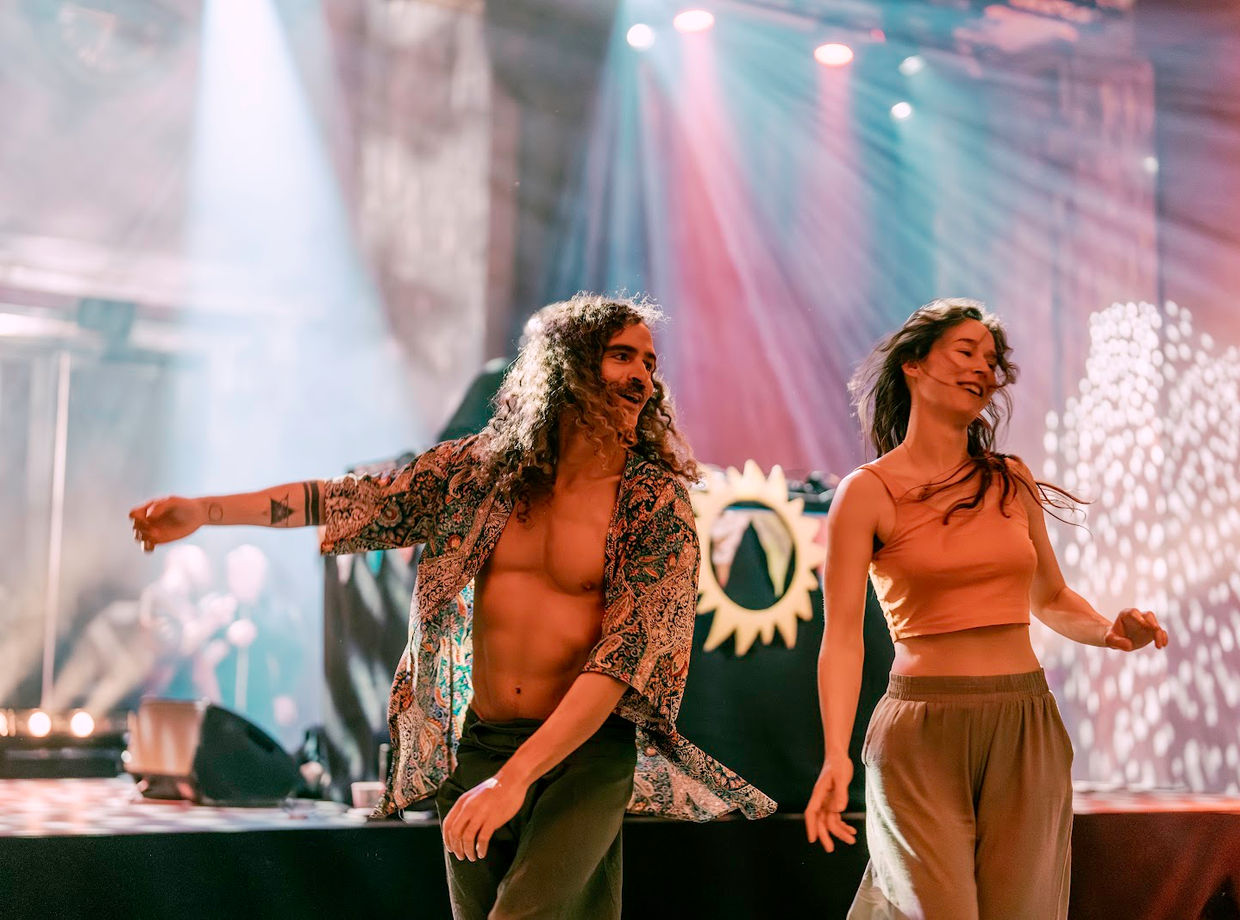 Two dancers moving on the stage